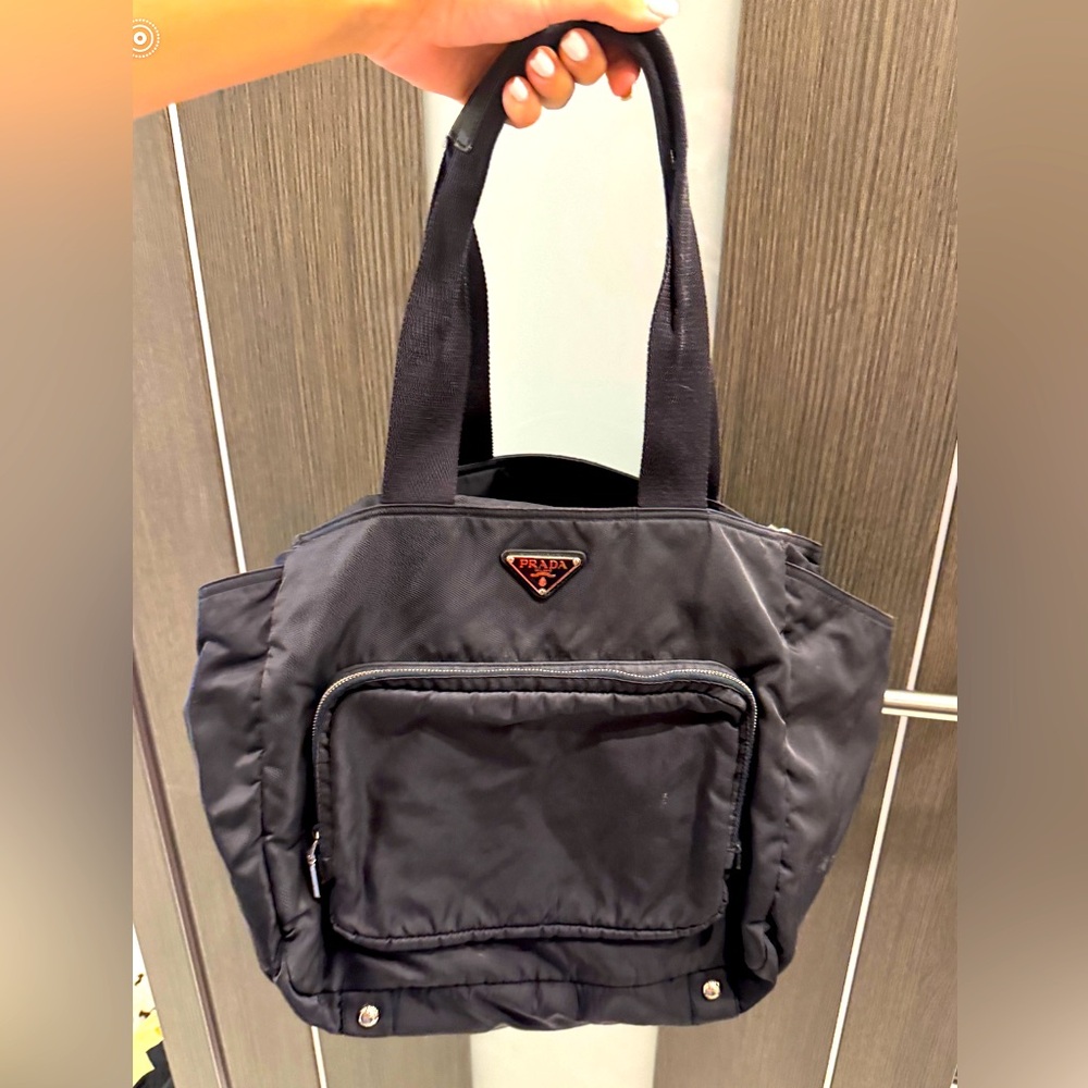 Authentic Prada Diaper Bag, NAVY, like new with changing pad.